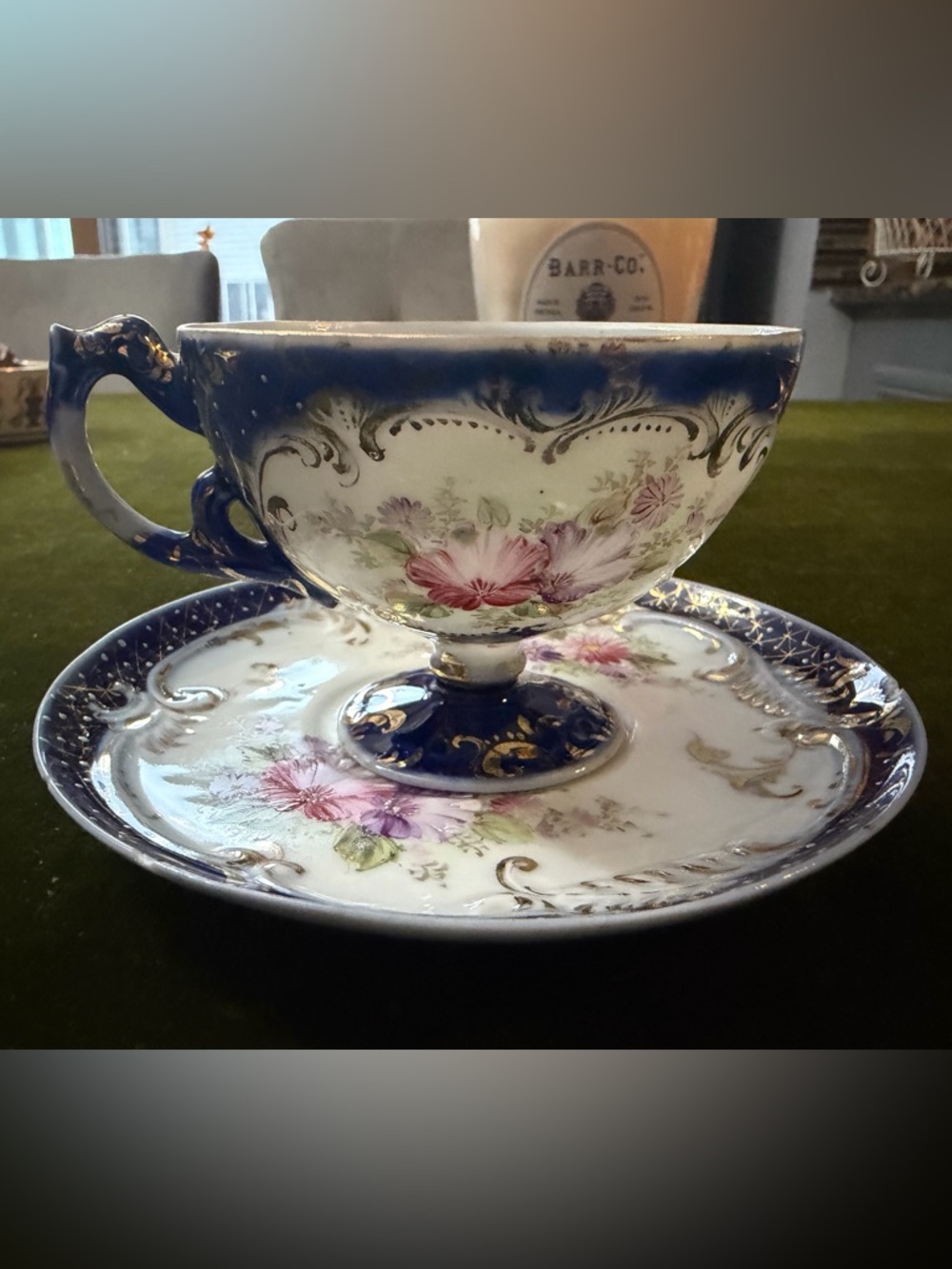 Antique porcelain teacup and saucer set